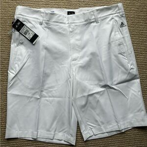 NWT Adidas Men’s gold shorts, size 36